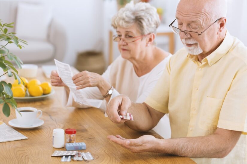 Elderly Couple Reading Medication Usage Instruction