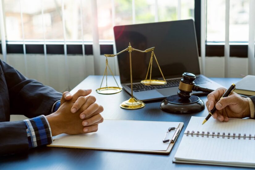 Businessman and lawyer discussing contract