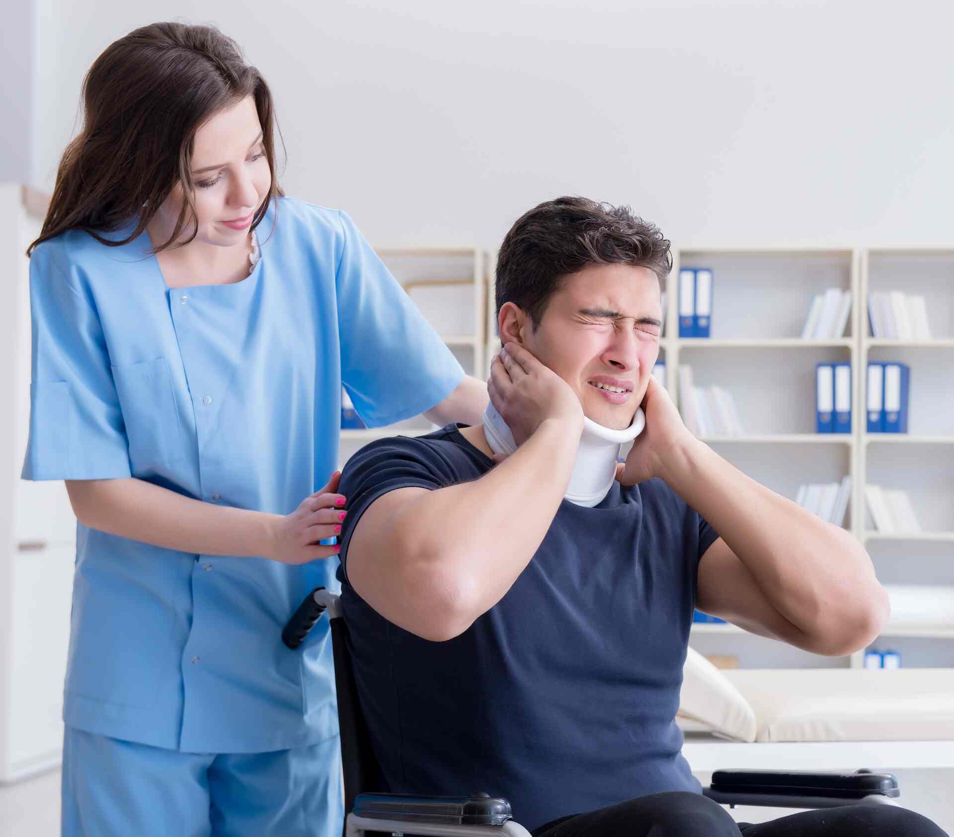 Man with neck injury visiting doctor for check-up